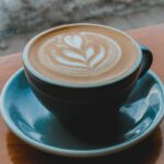 flat-white-in-black-mug-with-latte-art